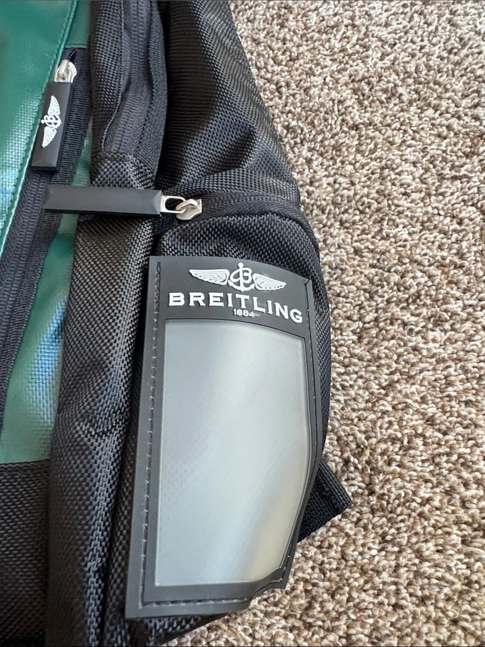 Breitling Green and Black Backpack with Bold Logo